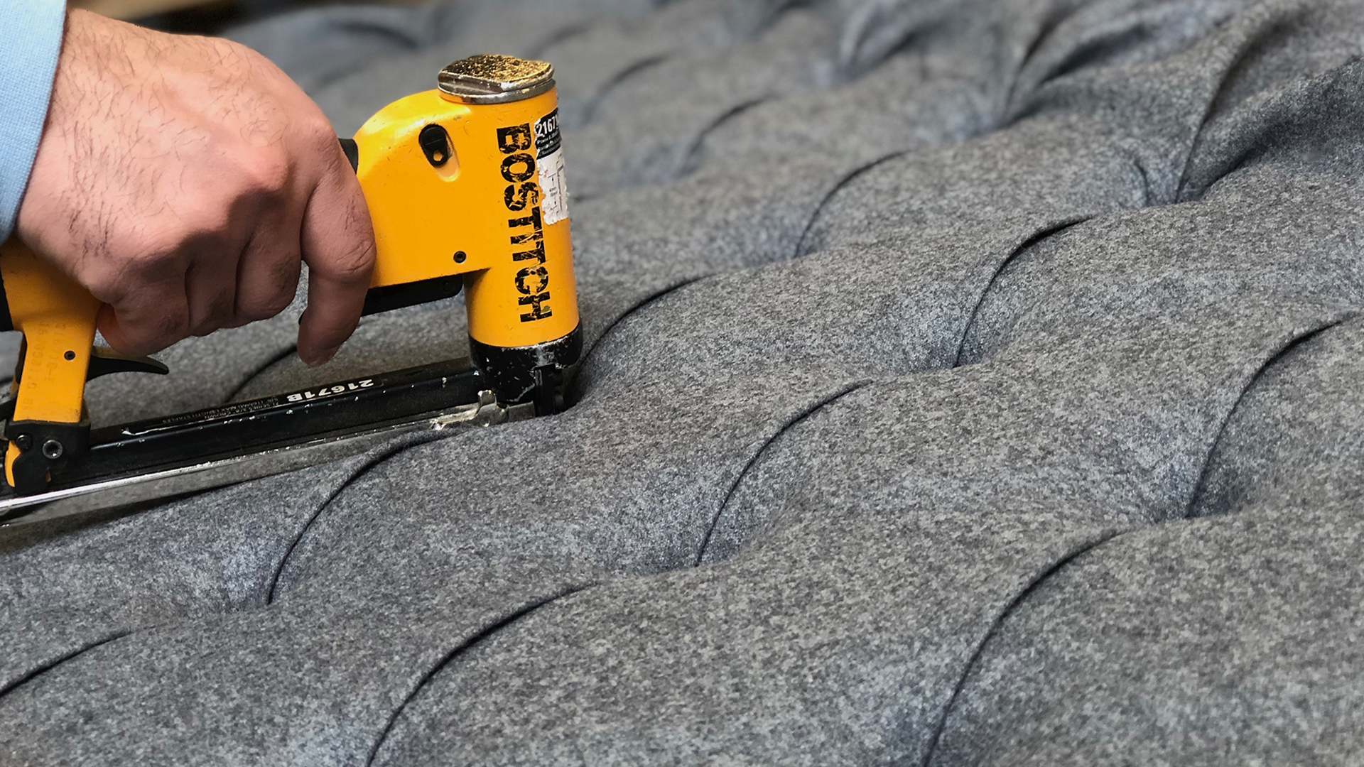 Hand-upholstering a frame